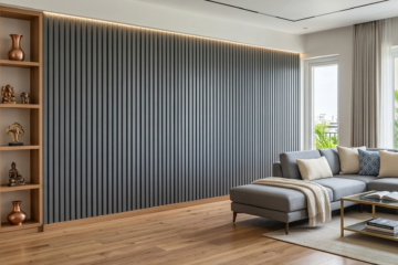 Modern Kolkata living room featuring fluted wall panels and moisture-proof interior design for damp walls before Durga Puja.